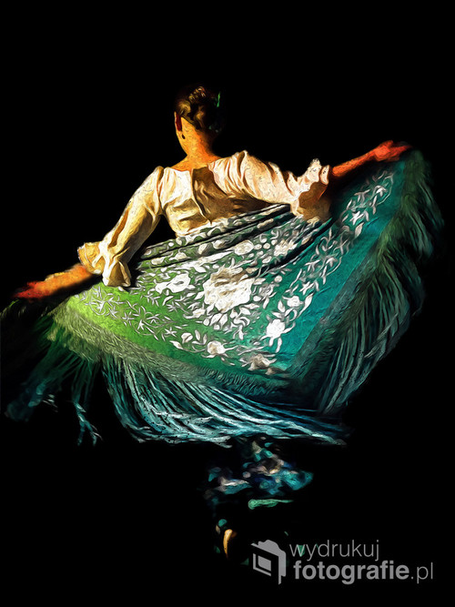Zdjęcie przedstawia polską tancerkę i nauczycielkę flamenco, Martę Dębską (Marta Robles). Wykonane zostało podczas koncertu z cyklu 