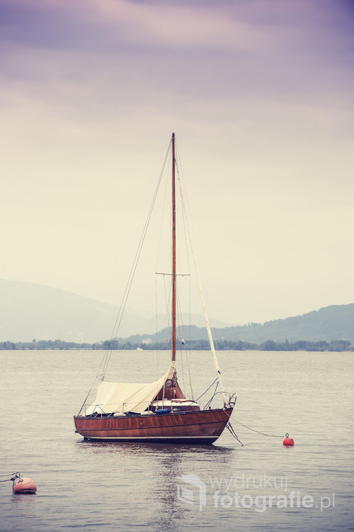 Lonely sailboat on the Constance Lake (Bodensee).