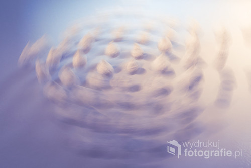 Paper balls in motion. An abstract picture.