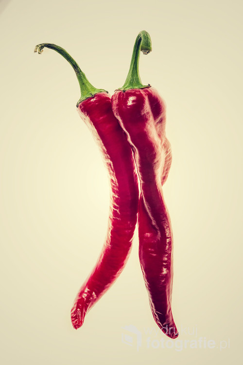 Two dancing hot peppers.