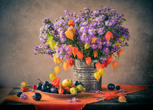 Still life with bouquet of colorful autumn flowers