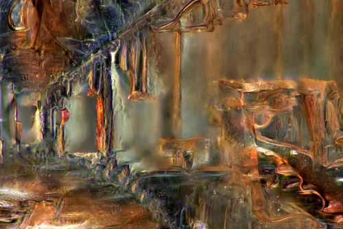 Fotografia przedstawia skrystalizowaną mieszaninę soli i cukru. Zdjęcie wykonano przy użyciu mikroskopu, w świetle spolaryzowanym, w powiększeniu 100 X 